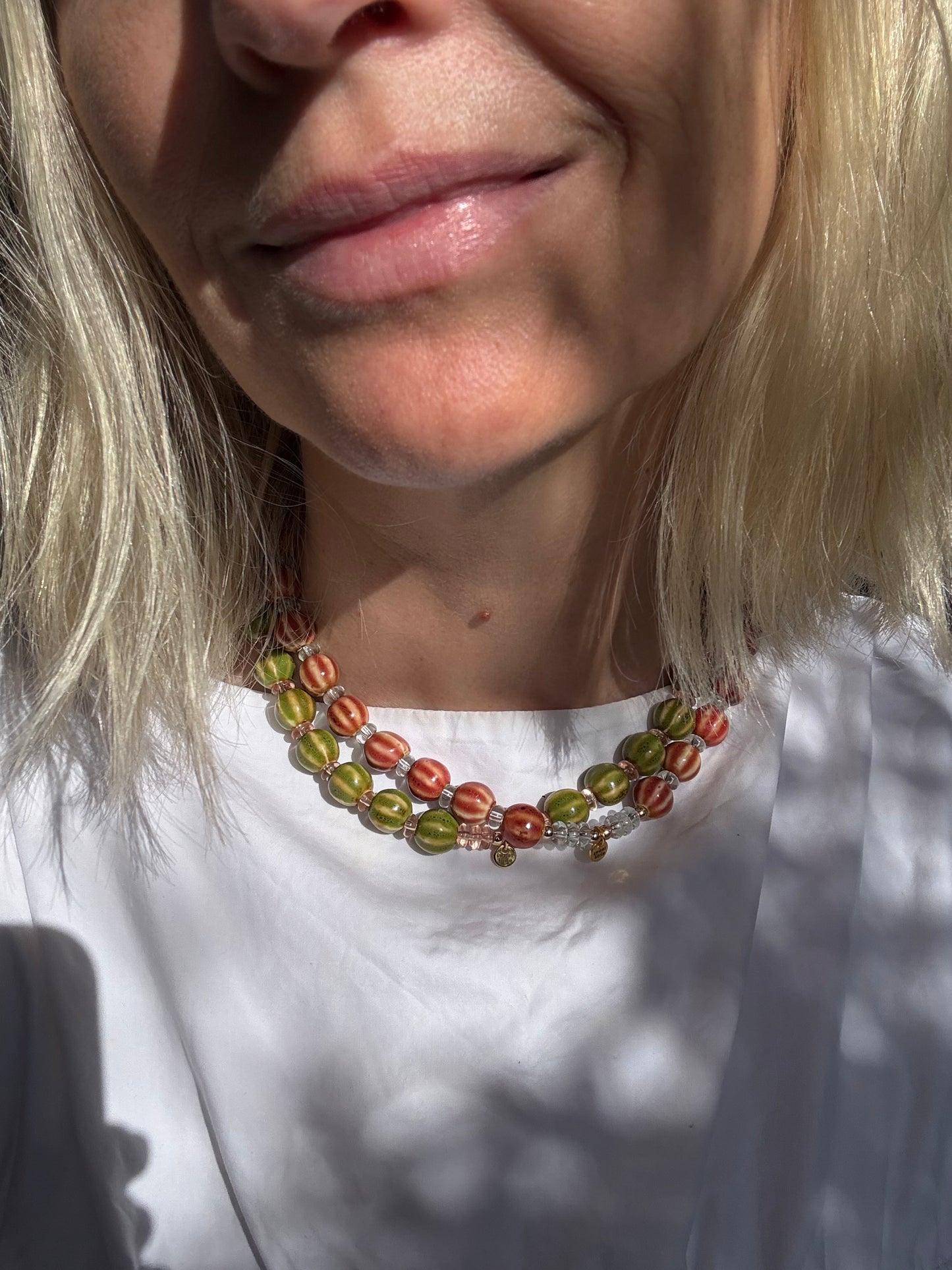 Striped ceramic and glass beaded necklaces