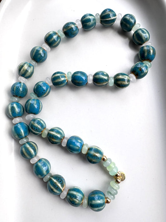 Striped ceramic and glass beaded necklaces