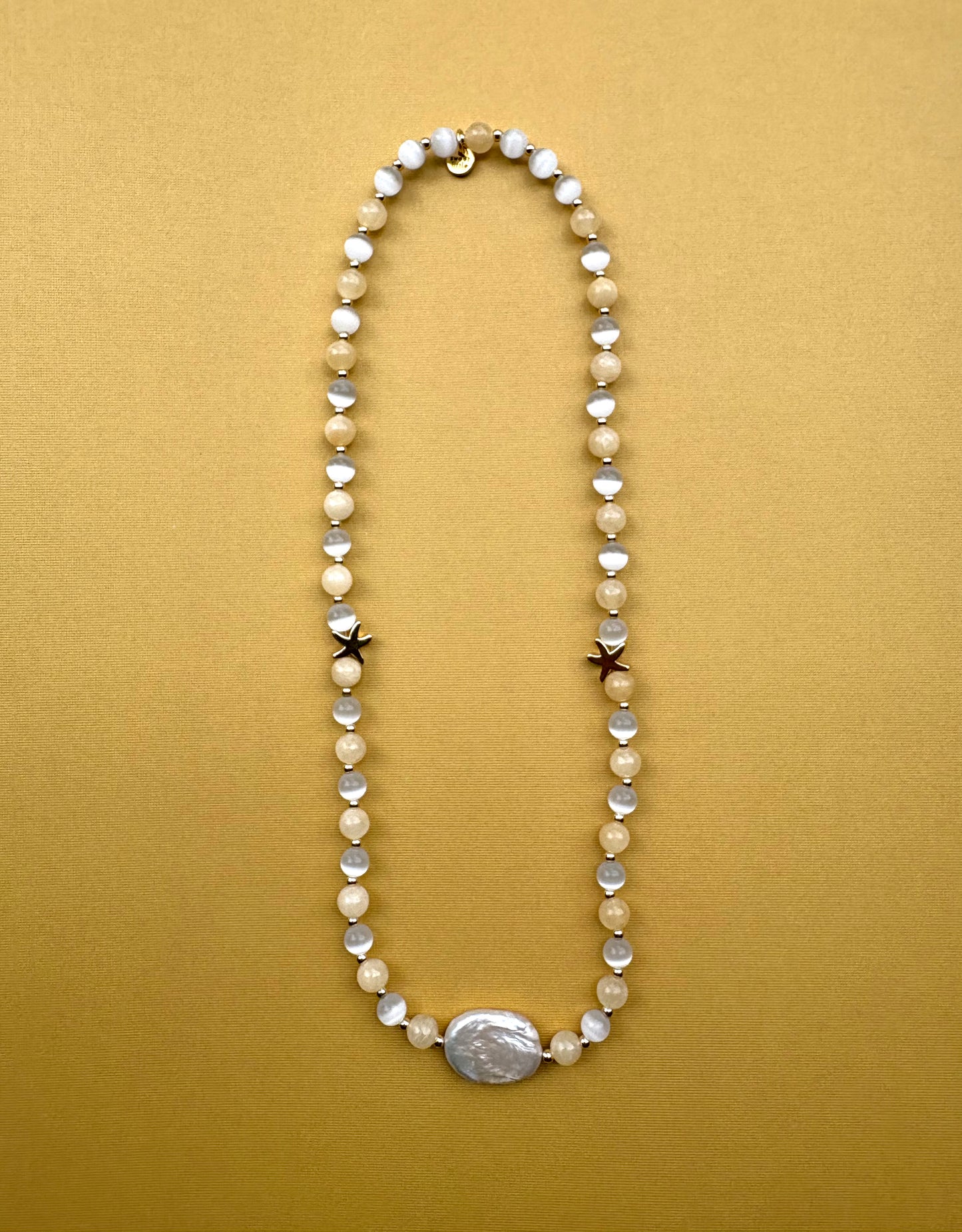Flat pearl baroque necklaces with semi precious stones