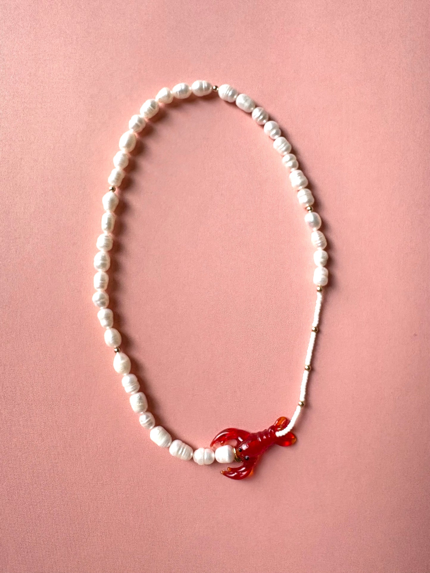 Pearl necklace with glass red lobster