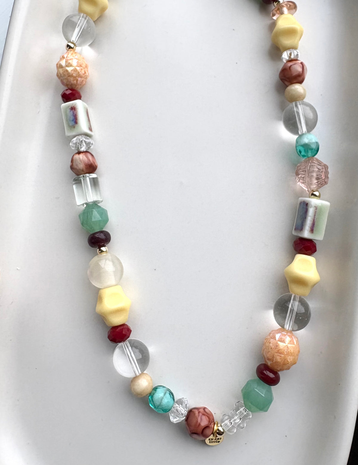 Browns, greens and cream mixed bead necklace