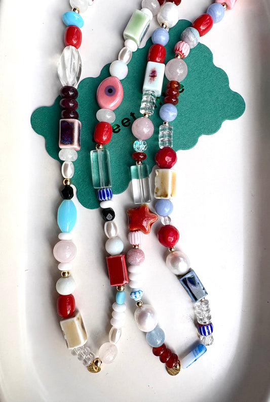 Mix-up bright necklaces with vintage beads