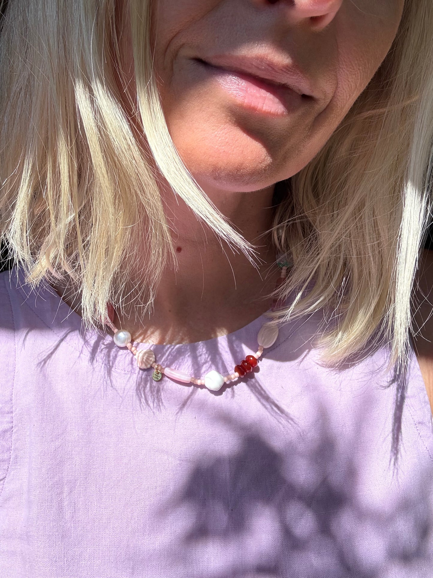 Charm necklace in pinks
