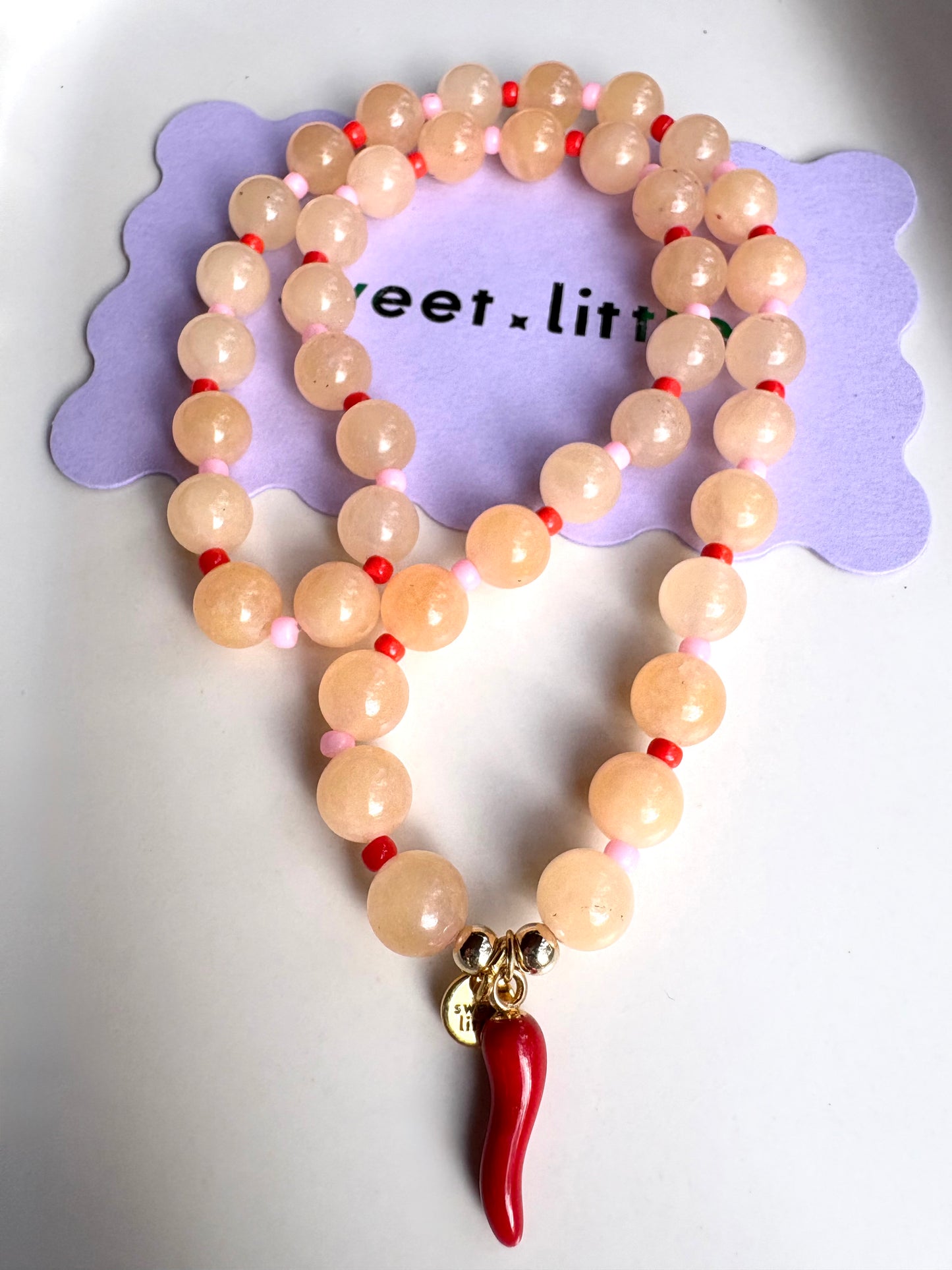 Semi-precious stone necklaces with charms
