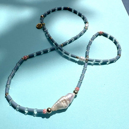 Fine blue tube bead necklace with stick pearl