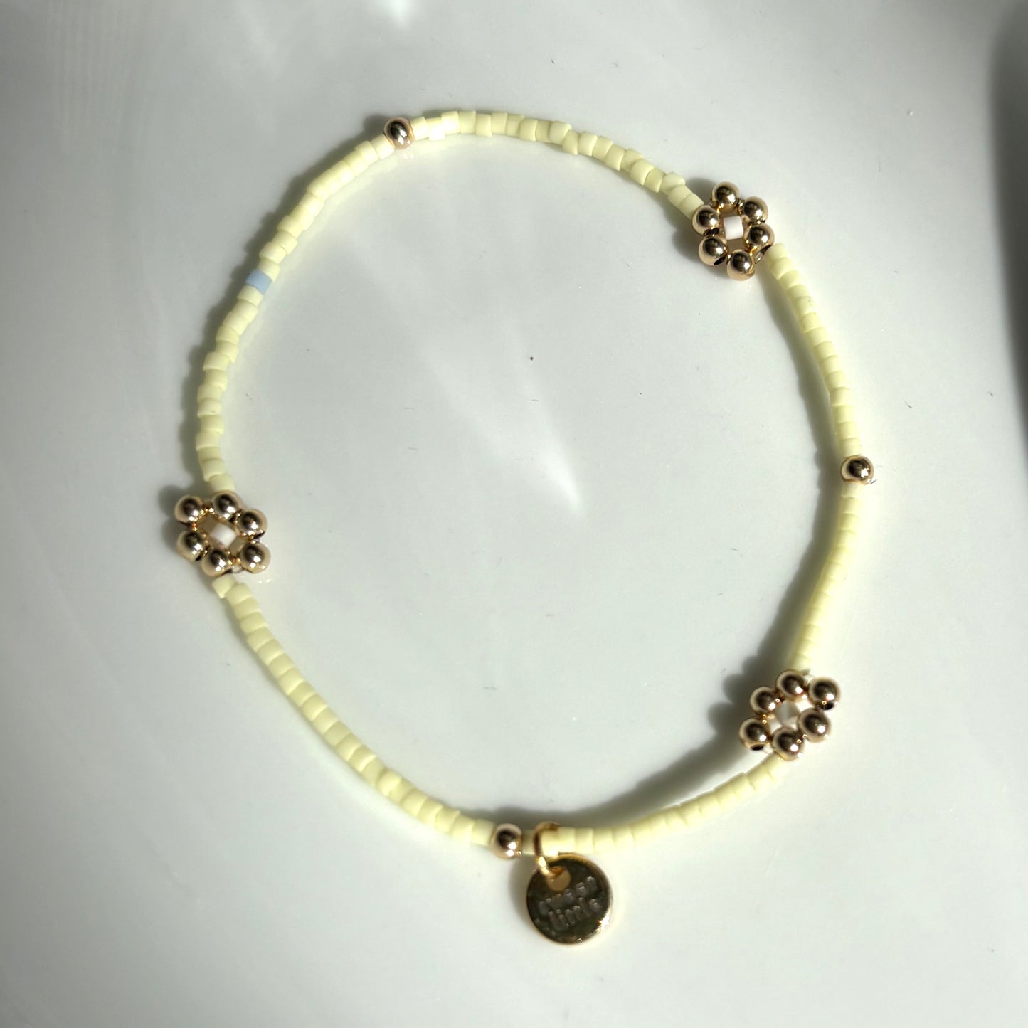 Gold flower fine beaded bracelets