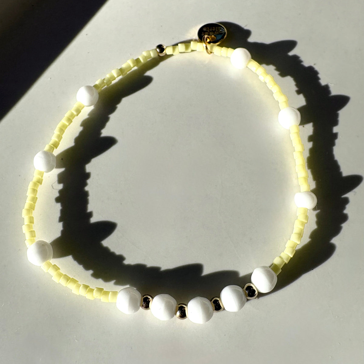 Soft lemon yellow and white bracelet