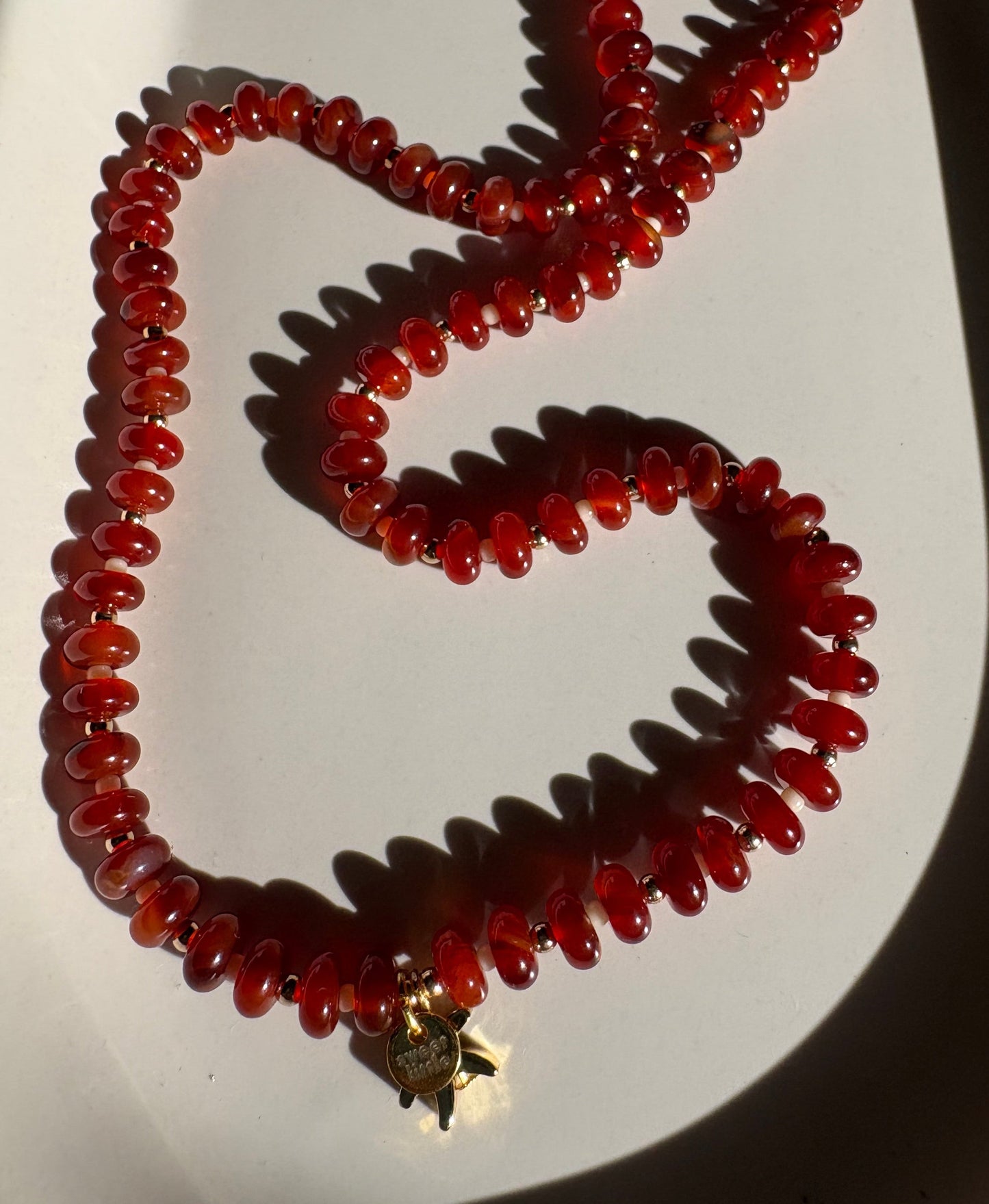 Semi-precious stone necklaces with charms