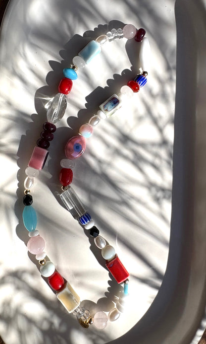 Mix-up bright necklaces with vintage beads