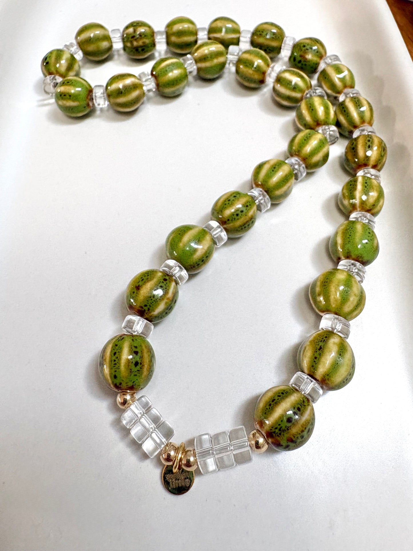 Striped ceramic and glass beaded necklaces