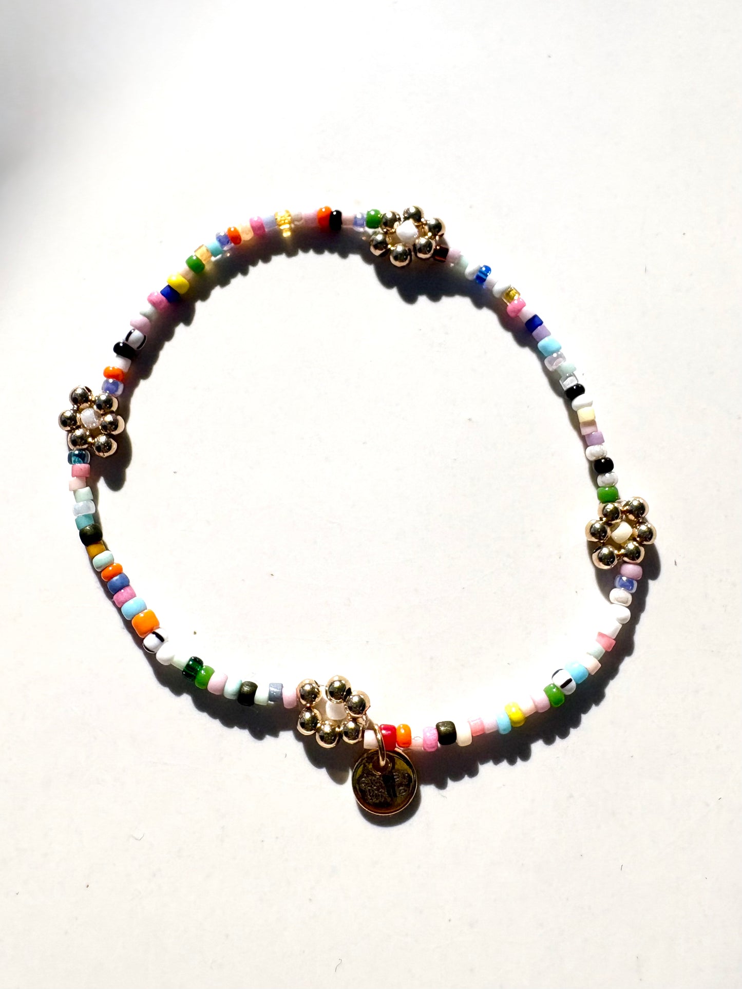 Gold flower fine beaded bracelets