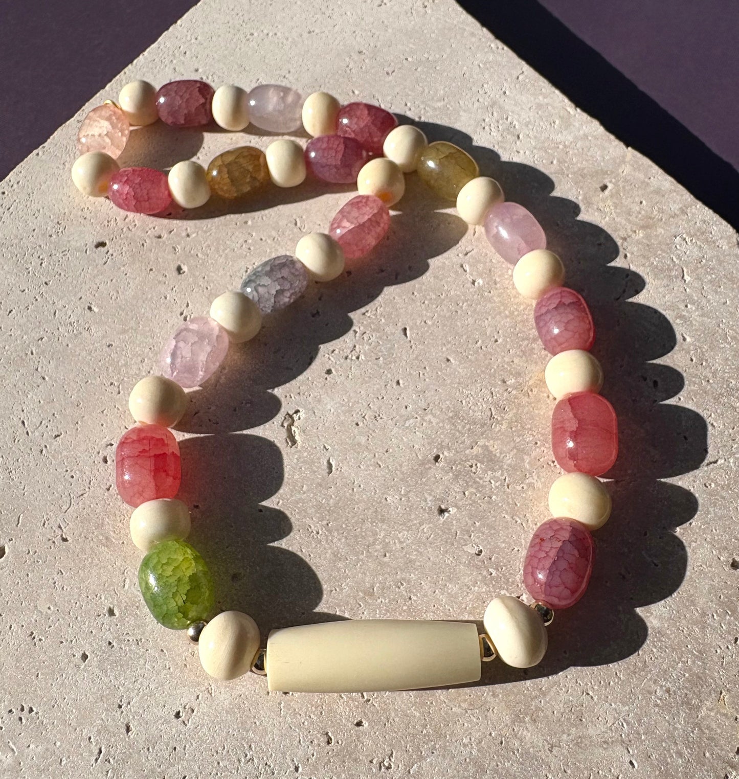 Vintage bone beaded necklace with colourful glass jellybean beads.