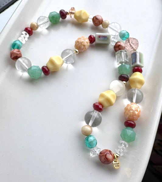 Browns, greens and cream mixed bead necklace