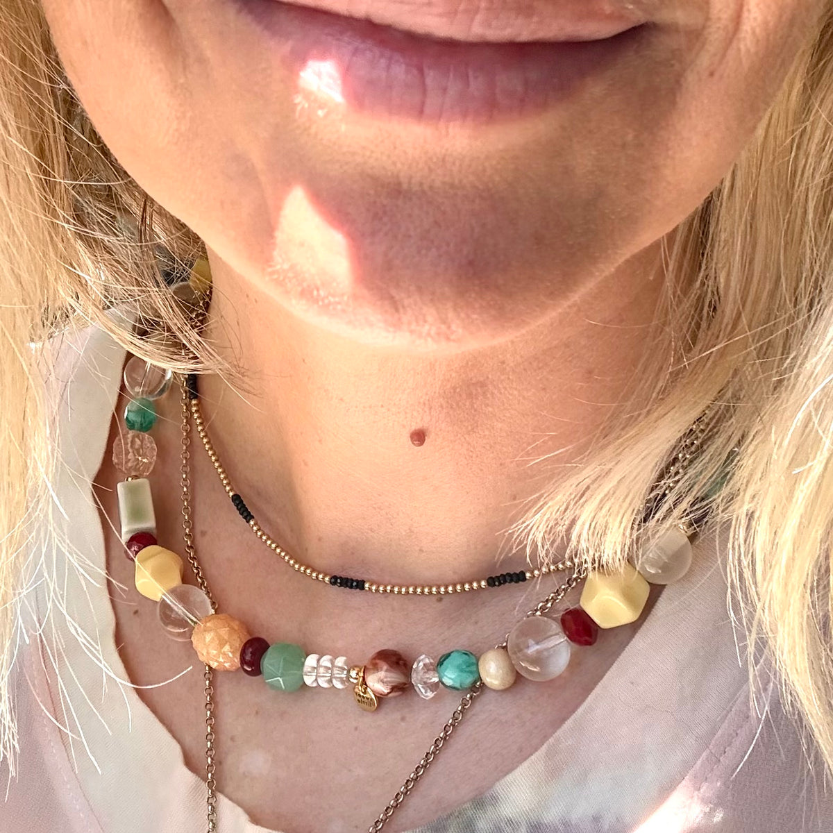 Browns, greens and cream mixed bead necklace